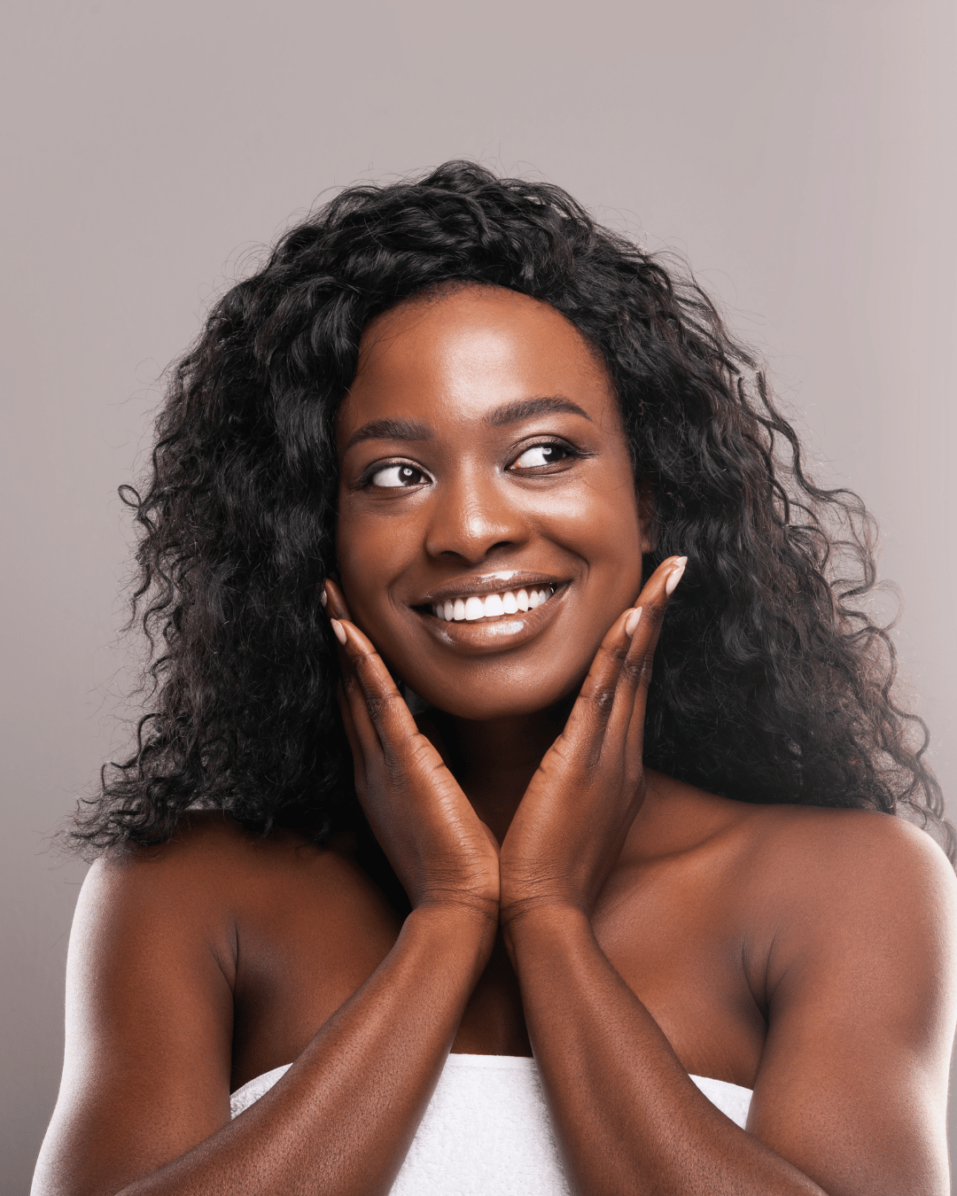 black woman touch her skin-- acne treatment services in Fayetteville, NC